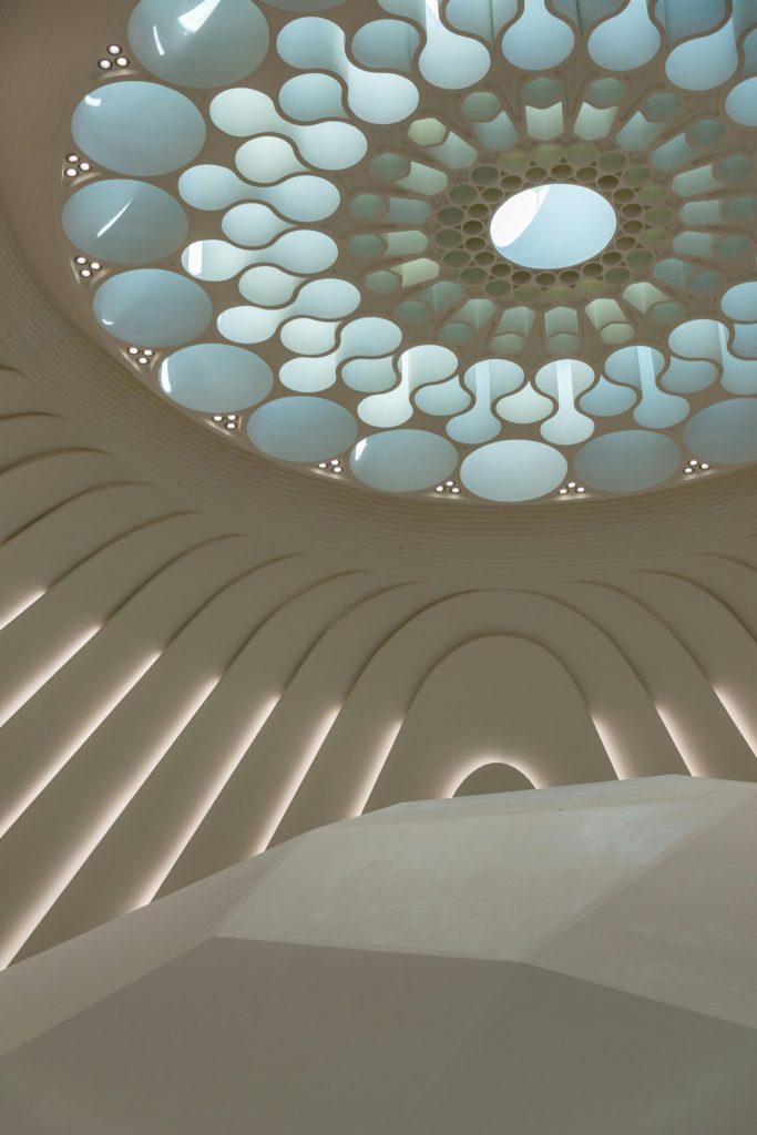 Captivating view of a futuristic dome interior with intricate patterns and skylight.